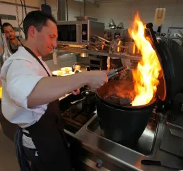 Feuer und Flamme sein