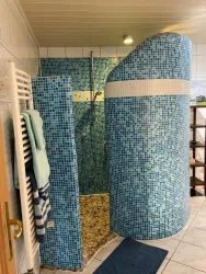 Badezimmer mit Schneckendusche