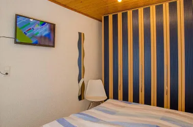 Schlafzimmer - Ferienwohnung im EG (© Haus Storck - Ferienwohnungen in Gimmeldingen)