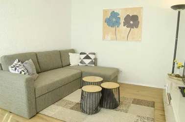 Wohnzimmer - Ferienwohnung im EG