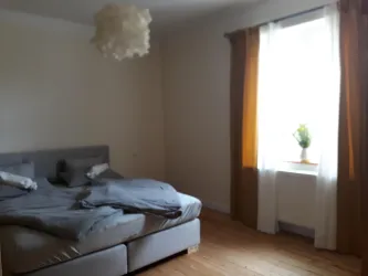 Schlafbereich Anna mit Blick in den Garten