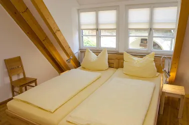 Apartment Idig - Schlafzimmer aus Vollholz
