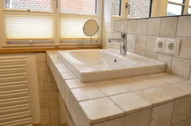 Apartment Idig - Tageslicht-Bad mit Dusche, WC