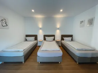 Dreibettzimmer