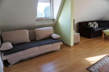 Wohnzimmer mit extra Sofa (© Strohm)