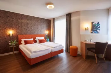 Doppelzimmer im Stadthotel - (© Foto: Thomas Brenner)
