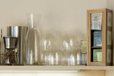 Kücheneinrichtung Biotee von Sonnentor (© Burggarten Appartements)