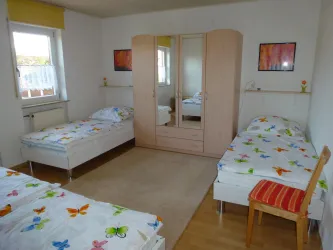 Schlafzimmer mit zqei Enzelbetten (© FeWo Abel)