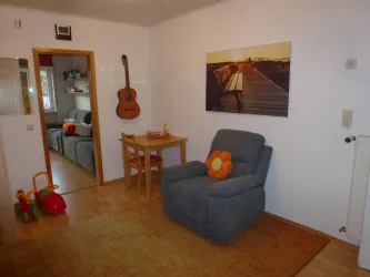 Mittelraum mit Musik und Leseecke (© FeWo Abel)