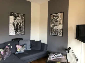 Maxime-Wohnzimmer mit Schlafsofa