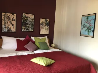 Schlafzimmer in Ferienwohnung Maxime
