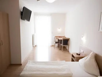 Zimmer mit Terrasse im Gästehaus
