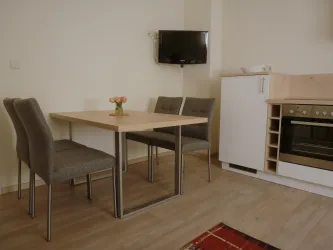 Ferienwohnung Traubenvogel Esstisch