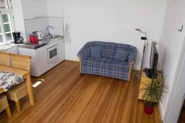 Wohn/Küchenbereich, Schlafsofa Ap. 3 (© Gästezimmer Mittelgasse)