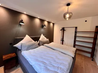 Schlafzimmer (© Ferienwohnung Apartement Kropsbach)