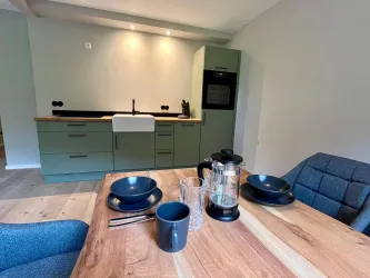 Eßbereich und Küche (© Ferienwohnung Apartement Kropsbach)