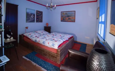 Schlafzimmer_Blau (© Gästehaus im Wolsel)