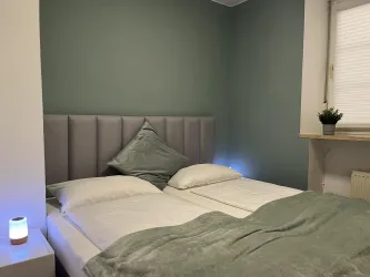 R03 - 12 - Schlafzimmer - Doppelbett