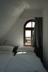 Schlafzimmer (© Vinotel Weinstrasse)